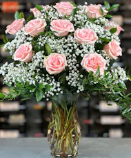 One Dozen Soft Pink Roses With Baby's Breath