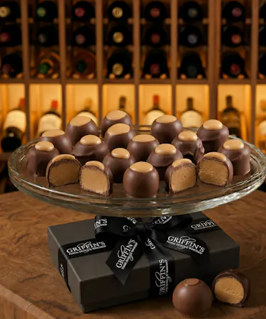 Handcrafted Columbus Ohio Amish peanut butter buckeyes coated in rich milk chocolate and packaged in Griffin's signature gift box.