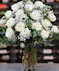 18 white roses with baby's breath delivered by columbus ohio florist Griffins Floral