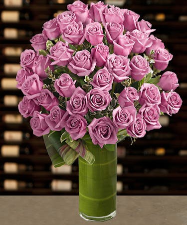 48 Lavender Roses Arranged By Griffins Floral Design