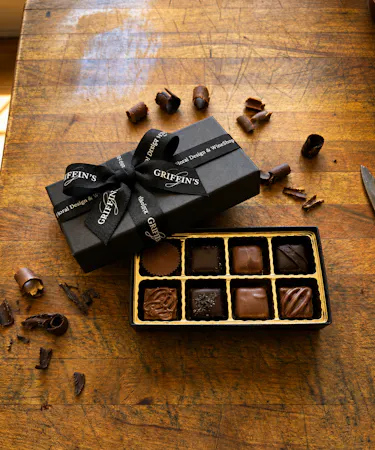 Handcrafted Ohio Amish gourmet chocolates including buckeyes, truffles, chocolate-covered pretzels, Oreos, cherries, and salted caramels.