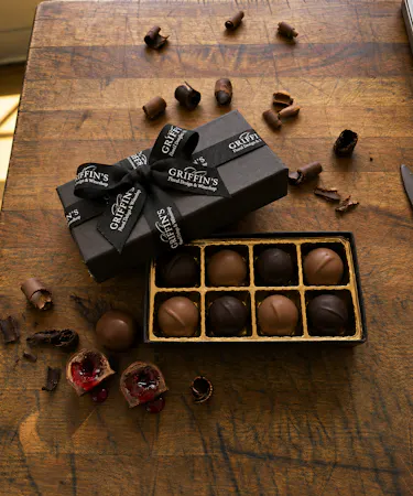 Handcrafted Ohio Amish chocolate-covered cherries in milk and dark chocolate gift boxes from Griffin's Floral Design.