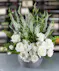 Dancing Lady arrangement with white Playa Blanca roses, spray roses, and veronica by a Columbus, Ohio florist.