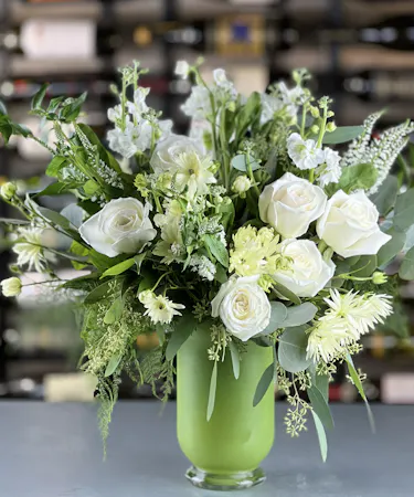 Elegant white rose and ranunculus bouquet delivered by a Columbus, Ohio florist Griffins Floral