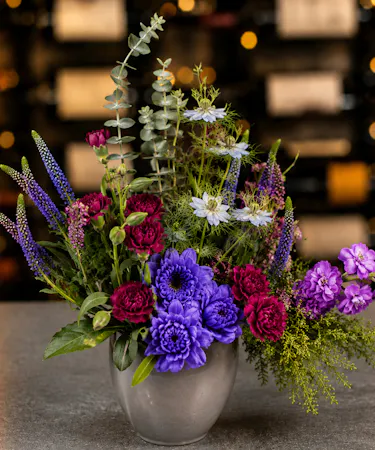 Contemporary violet anemones and wildflower-inspired Memphis Botanicals arrangement delivered in Columbus, Ohio.