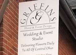 A sign promotes our Wedding and Event Studio