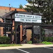 An exterior view of our classic Flower and Wine Shop